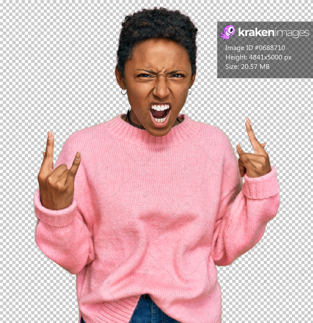 Young african american woman wearing casual clothes shouting with crazy expression doing rock symbol with hands up. music star. heavy concept.