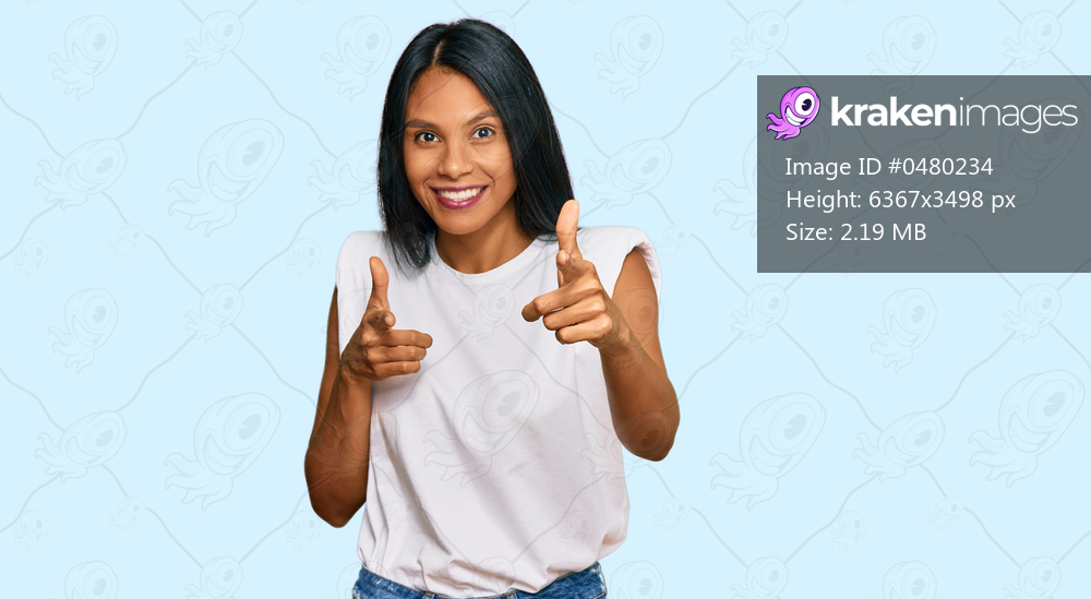 Young african american woman wearing casual clothes pointing fingers to camera with happy and funny face. good energy and vibes. 