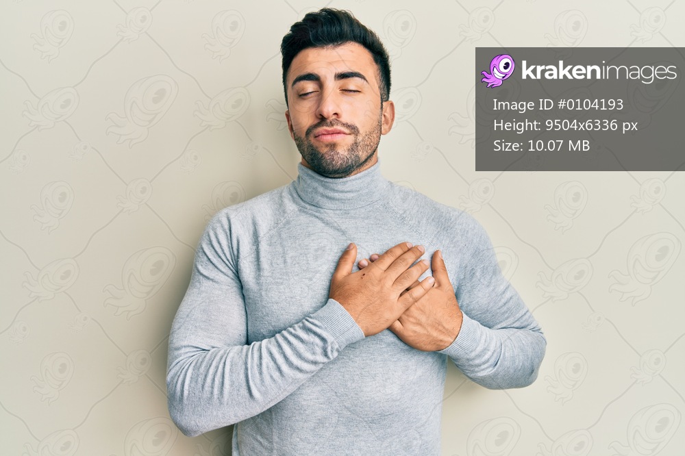 Young hispanic man wearing casual clothes smiling with hands on chest, eyes closed with grateful gesture on face. health concept. 