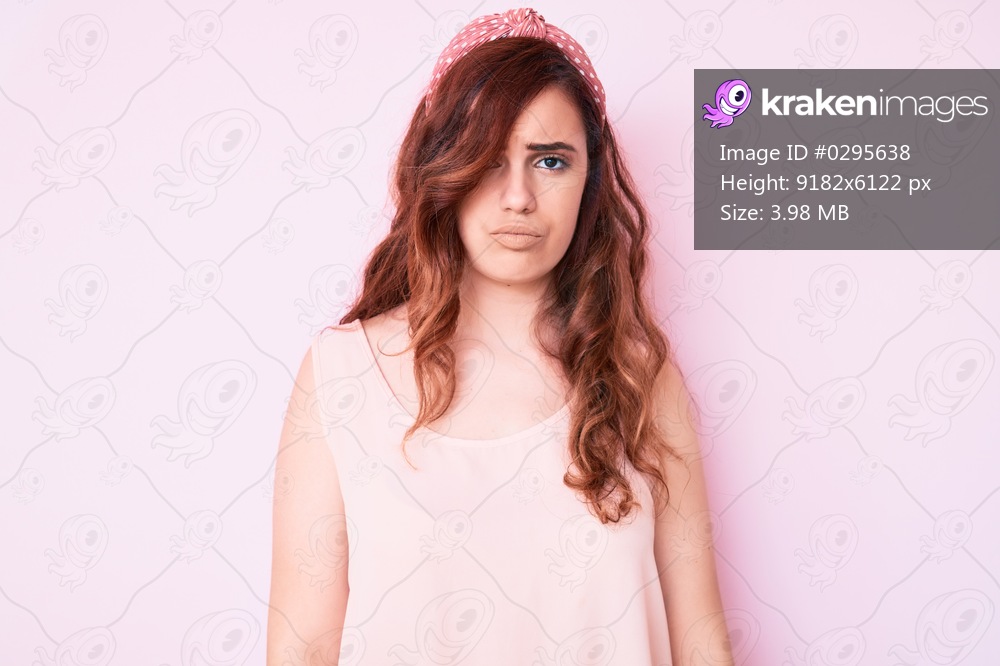 Young beautiful woman wearing casual clothes depressed and worry for distress, crying angry and afraid. sad expression. 