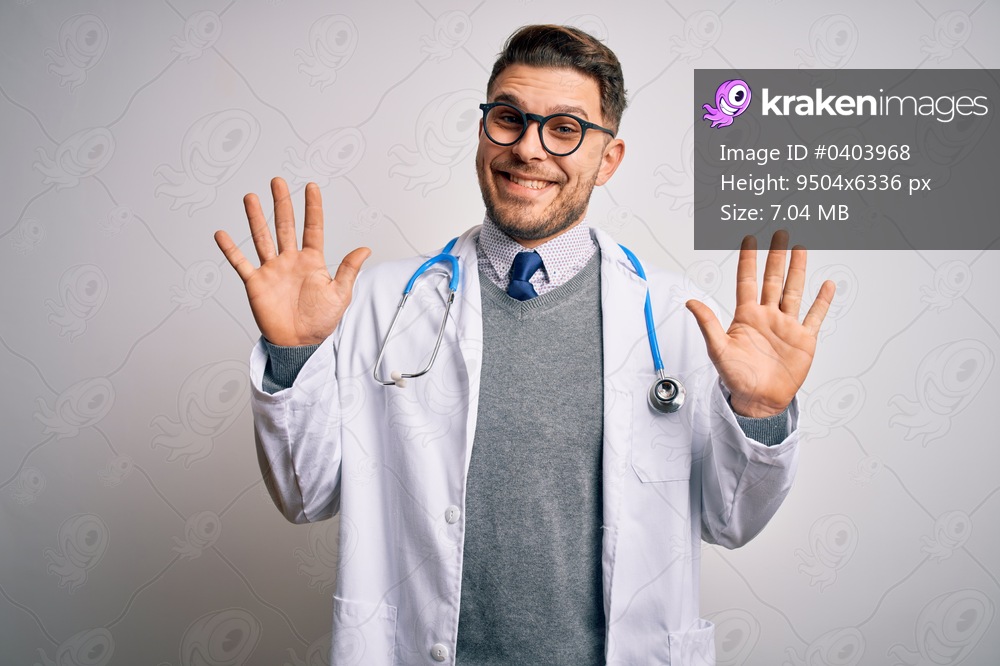 Young doctor man with blue eyes wearing medical coat and stethoscope over isolated background showing and pointing up with fingers number ten while smiling confident and happy.