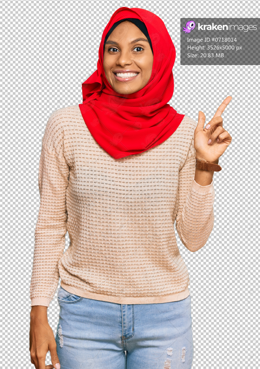 Young african american woman wearing traditional islamic hijab scarf with a big smile on face, pointing with hand finger to the side looking at the camera.