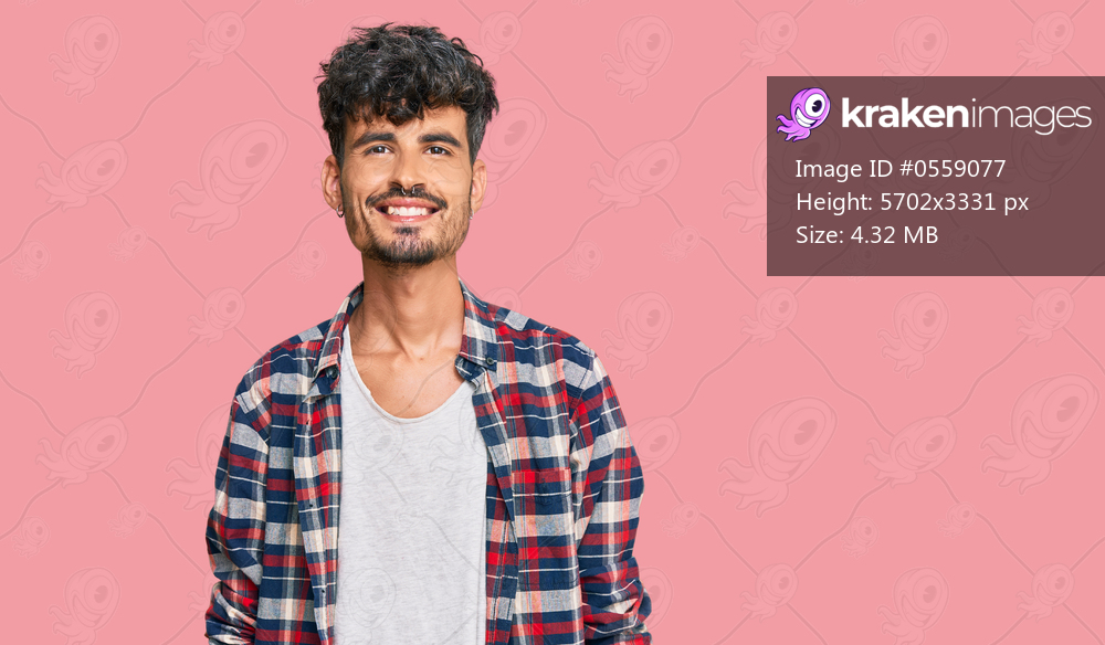 Young hispanic man wearing casual clothes with a happy and cool smile on face. lucky person. 