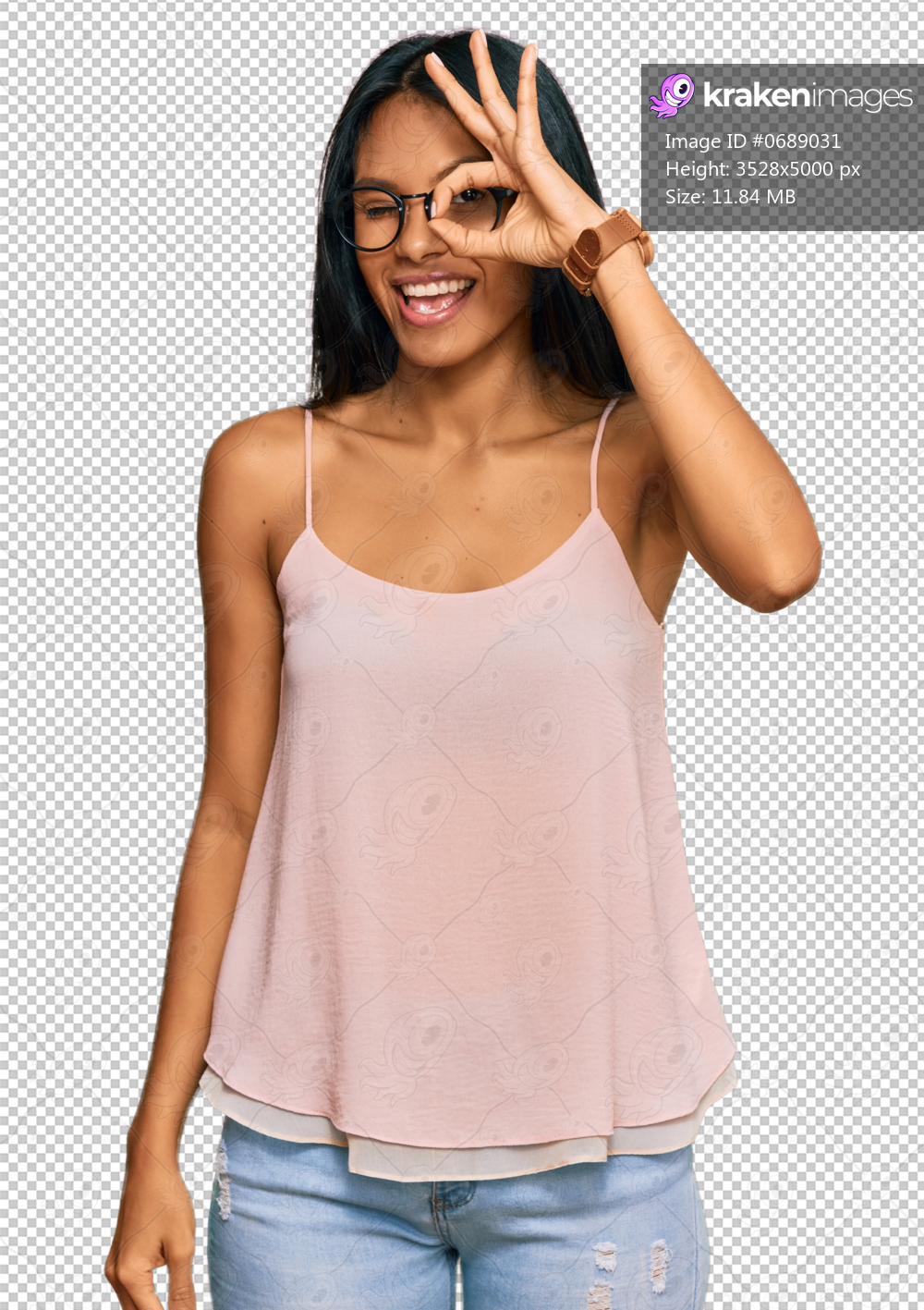 Young african american woman wearing casual clothes and glasses doing ok gesture with hand smiling, eye looking through fingers with happy face.
