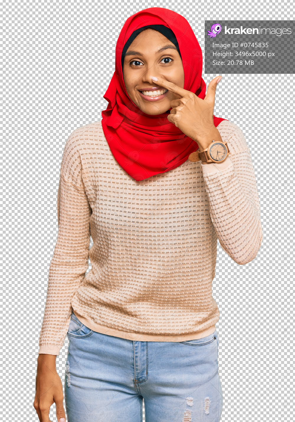 Young african american woman wearing traditional islamic hijab scarf pointing with hand finger to face and nose, smiling cheerful. beauty concept