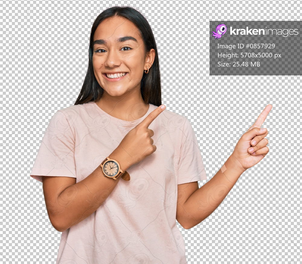 Young asian woman wearing casual clothes smiling and looking at the camera pointing with two hands and fingers to the side.