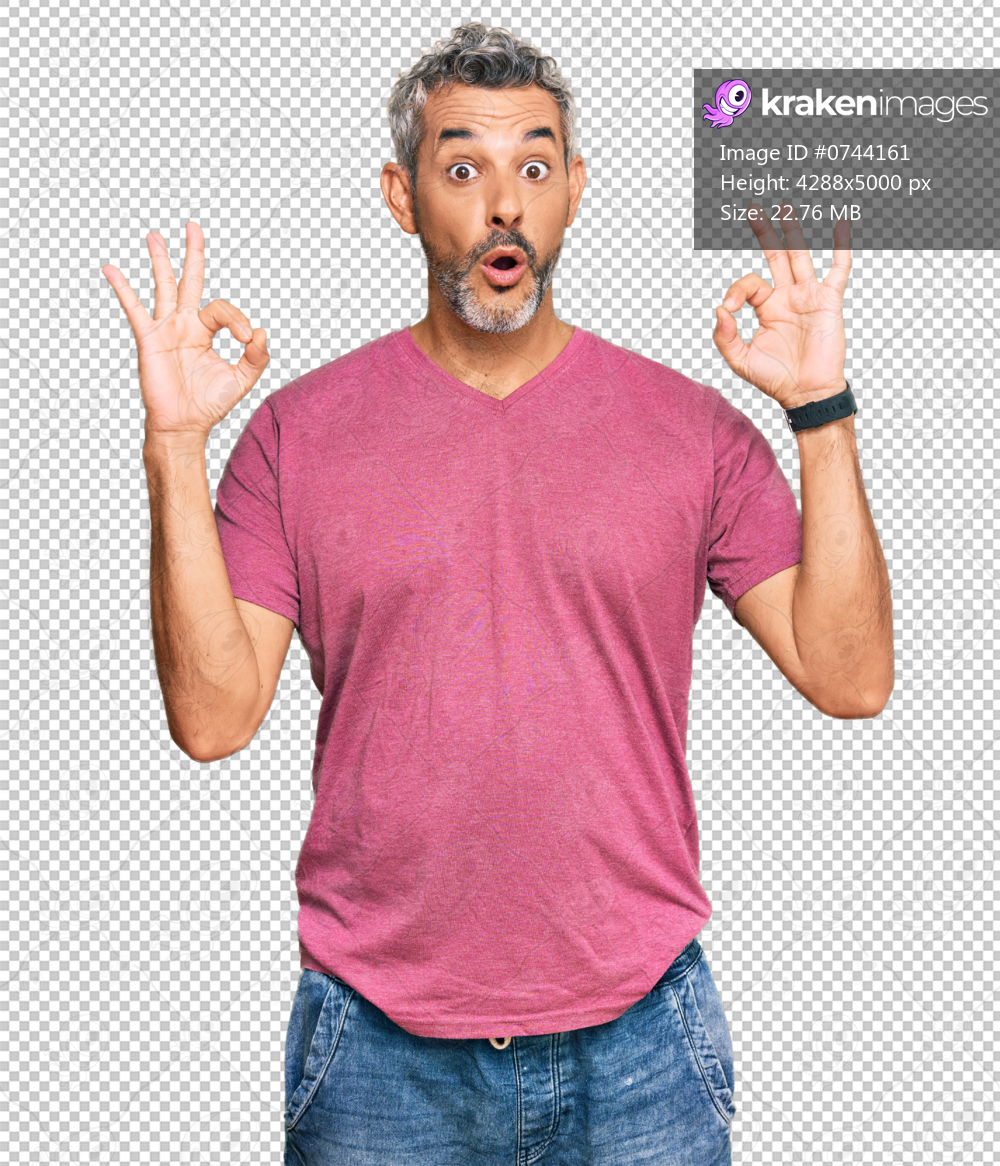 Middle age grey-haired man wearing casual clothes looking surprised and shocked doing ok approval symbol with fingers. crazy expression