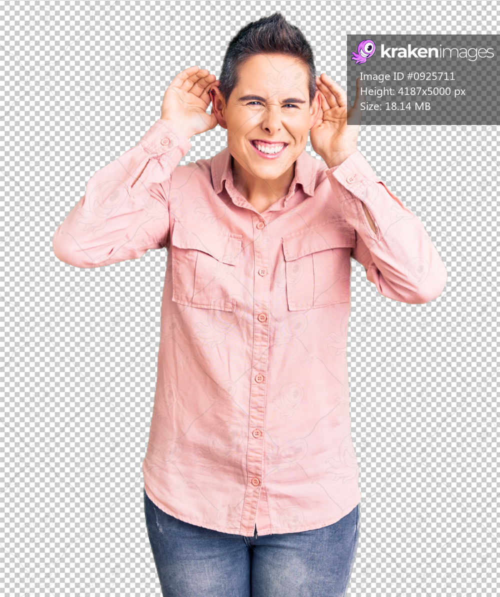 Young woman with short hair wearing casual clothes trying to hear both hands on ear gesture, curious for gossip. hearing problem, deaf