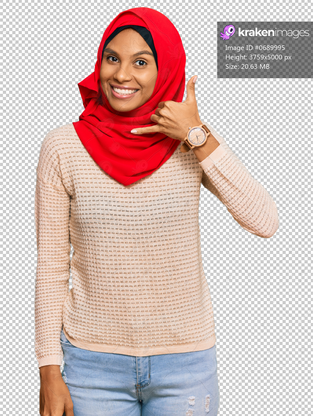 Young african american woman wearing traditional islamic hijab scarf smiling doing phone gesture with hand and fingers like talking on the telephone. communicating concepts.