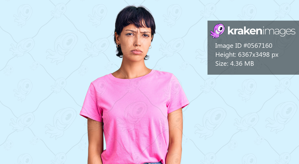 Young brunette woman with short hair wearing casual clothes depressed and worry for distress, crying angry and afraid. sad expression. 