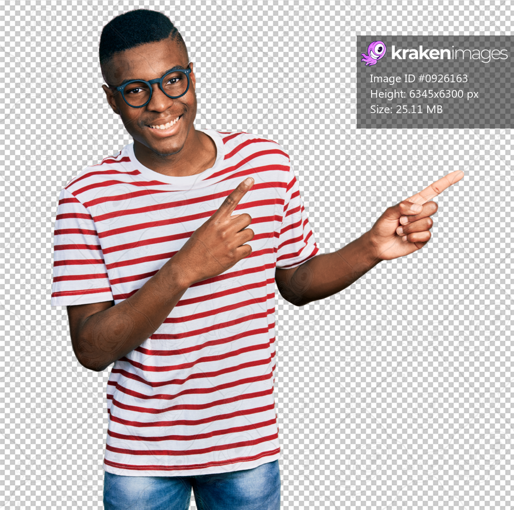 Young african american man wearing casual t shirt and glasses smiling and looking at the camera pointing with two hands and fingers to the side.