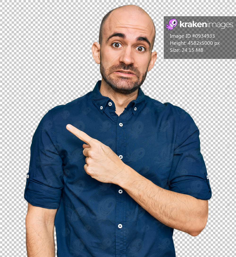 Young hispanic man wearing casual clothes pointing aside worried and nervous with forefinger, concerned and surprised expression
