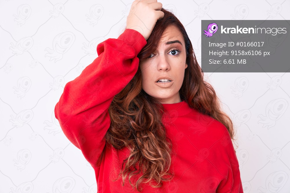 Young beautiful woman wearing casual clothes surprised with hand on head for mistake, remember error. forgot, bad memory concept. 