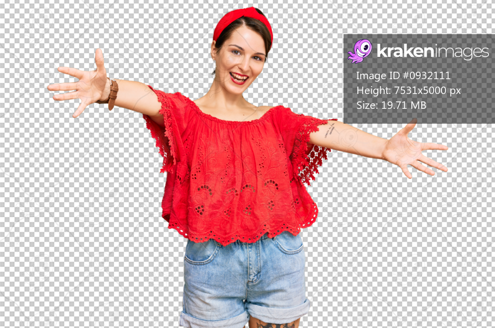 Young brunette woman with short hair wearing casual summer clothes and diadem looking at the camera smiling with open arms for hug. cheerful expression embracing happiness.