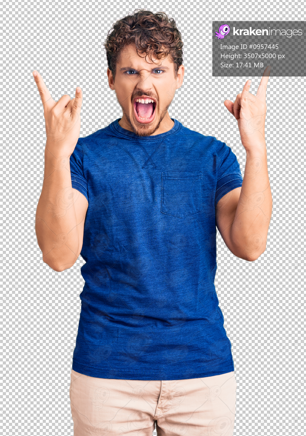 Young handsome man with curly hair wearing casual clothes shouting with crazy expression doing rock symbol with hands up. music star. heavy concept.