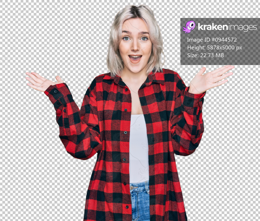 Young blonde girl wearing casual clothes celebrating victory with happy smile and winner expression with raised hands