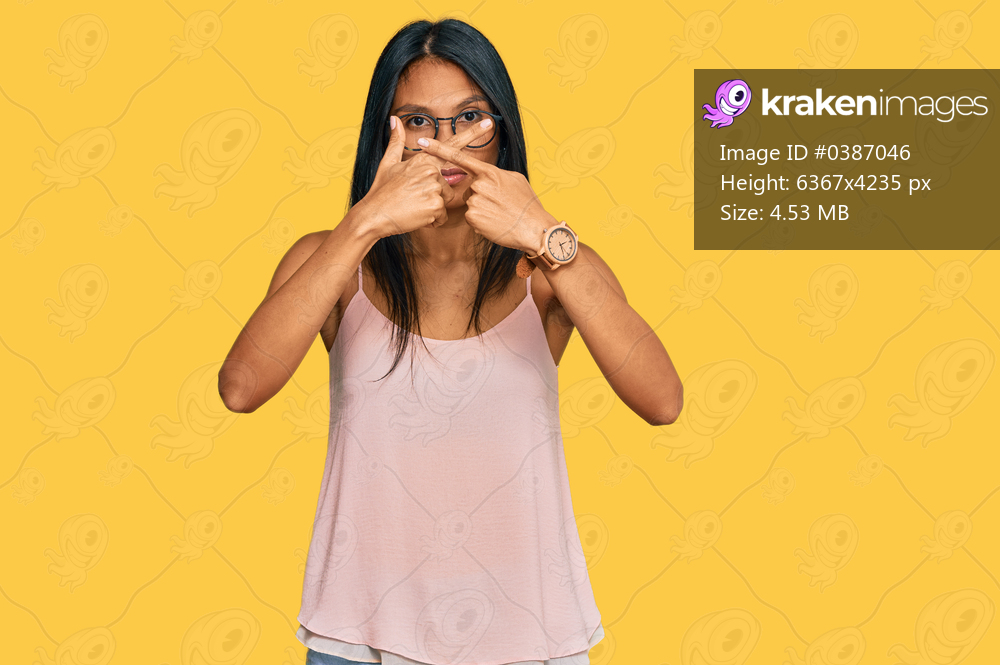 Young african american woman wearing casual clothes and glasses rejection expression crossing fingers doing negative sign 