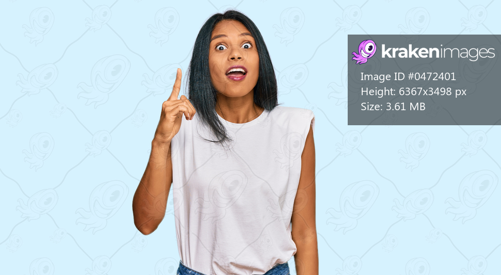 Young african american woman wearing casual clothes pointing finger up with successful idea. exited and happy. number one. 