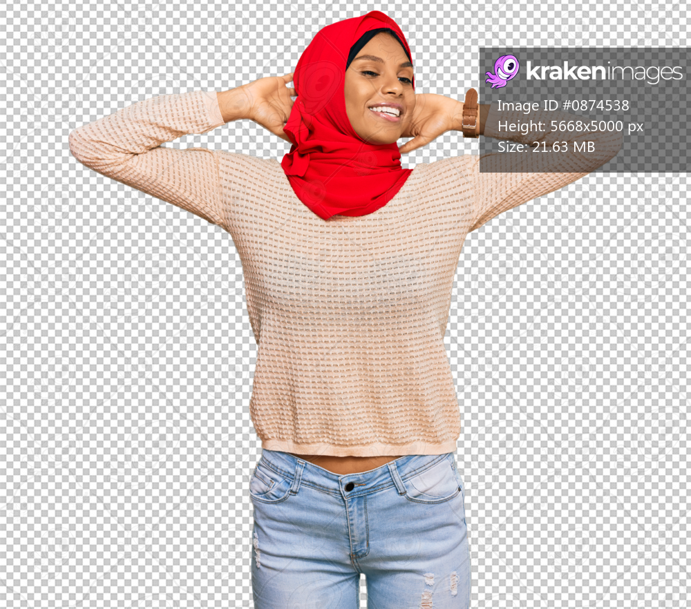 Young african american woman wearing traditional islamic hijab scarf relaxing and stretching, arms and hands behind head and neck smiling happy