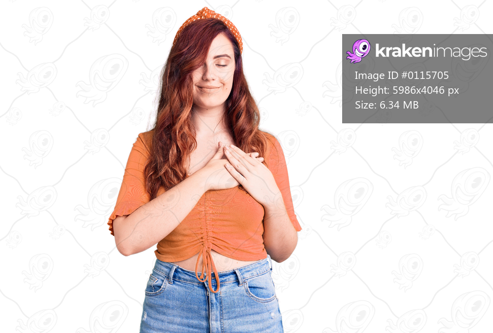 Young beautiful woman wearing casual clothes smiling with hands on chest with closed eyes and grateful gesture on face. health concept. 