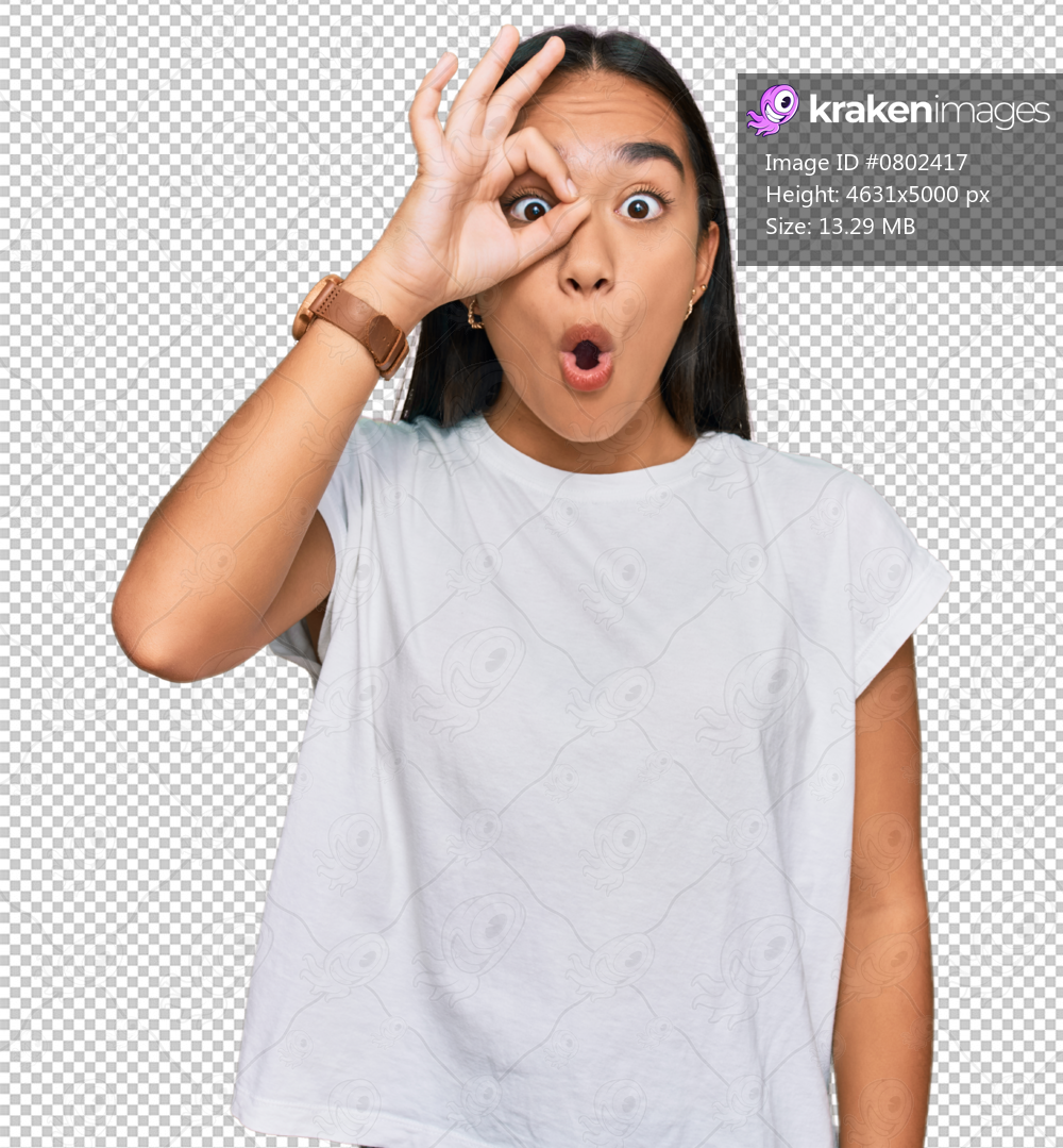 Young asian woman wearing casual white t shirt doing ok gesture shocked with surprised face, eye looking through fingers. unbelieving expression.