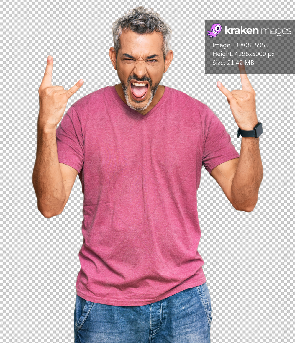 Middle age grey-haired man wearing casual clothes shouting with crazy expression doing rock symbol with hands up. music star. heavy music concept.