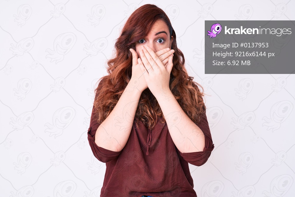 Young beautiful woman wearing casual clothes shocked covering mouth with hands for mistake. secret concept. 