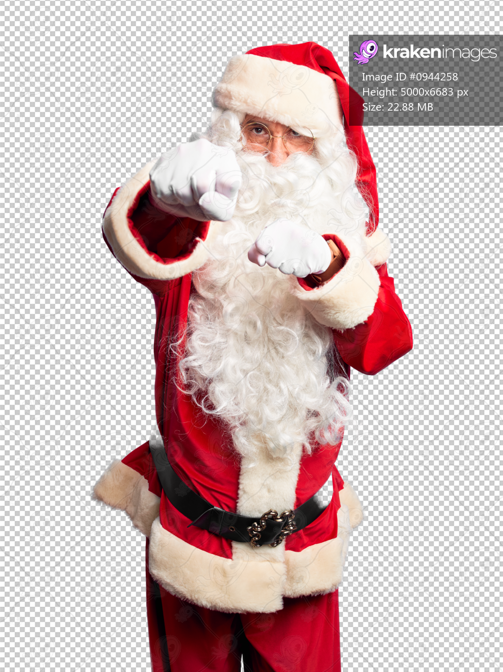 Middle age handsome man wearing Santa Claus costume and beard standing Punching fist to fight, aggressive and angry attack, threat and violence