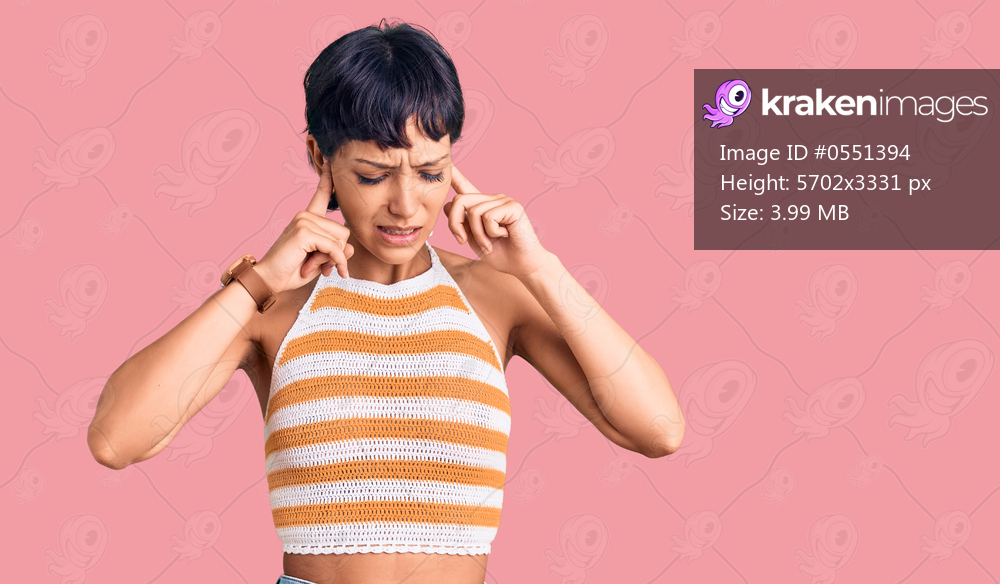 Young brunette woman with short hair wearing casual clothes covering ears with fingers with annoyed expression for the noise of loud music. deaf concept. 