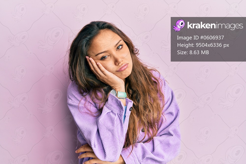 Young hispanic girl wearing casual clothes thinking looking tired and bored with depression problems with crossed arms. 