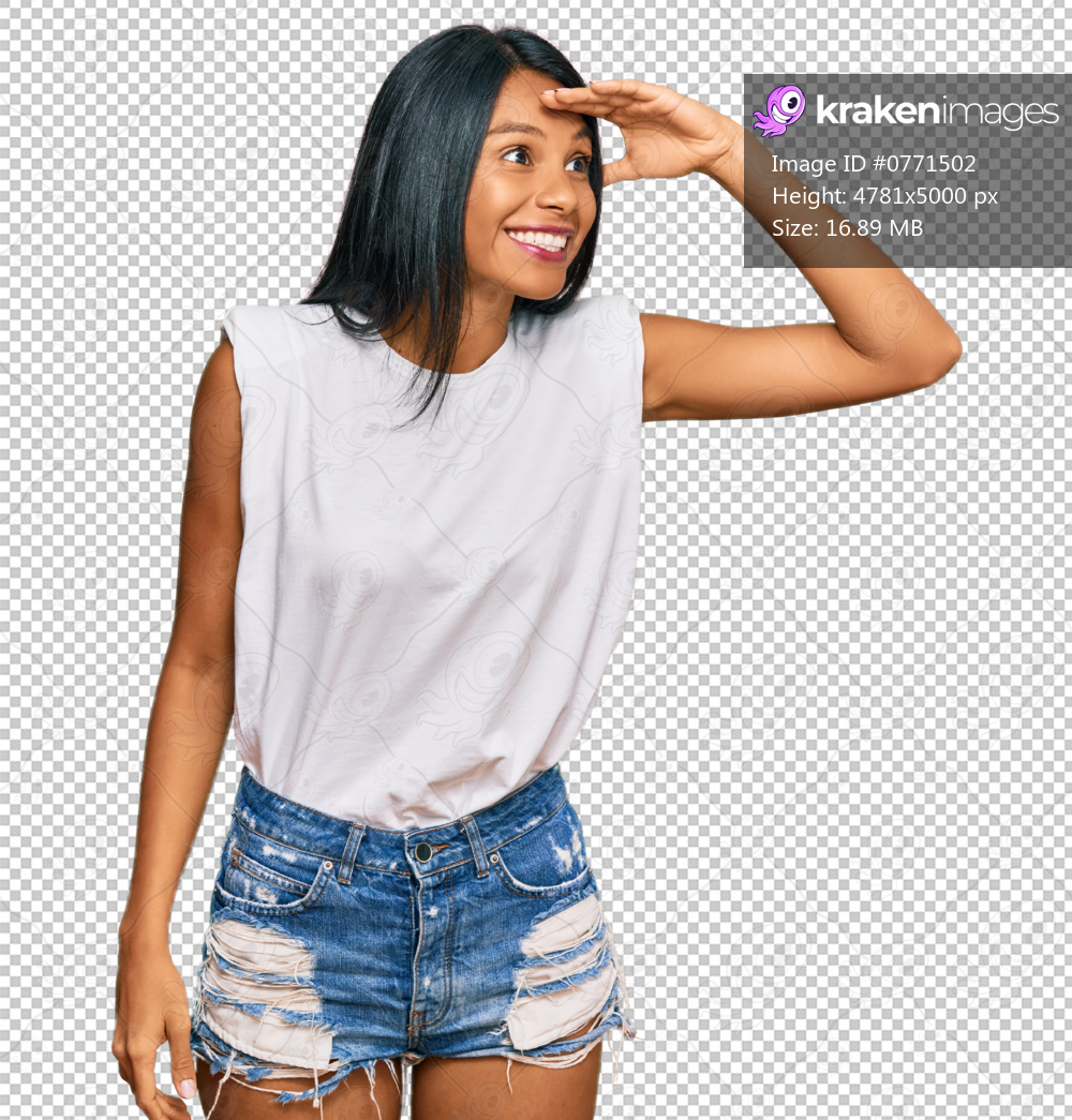Young african american woman wearing casual clothes very happy and smiling looking far away with hand over head. searching concept.