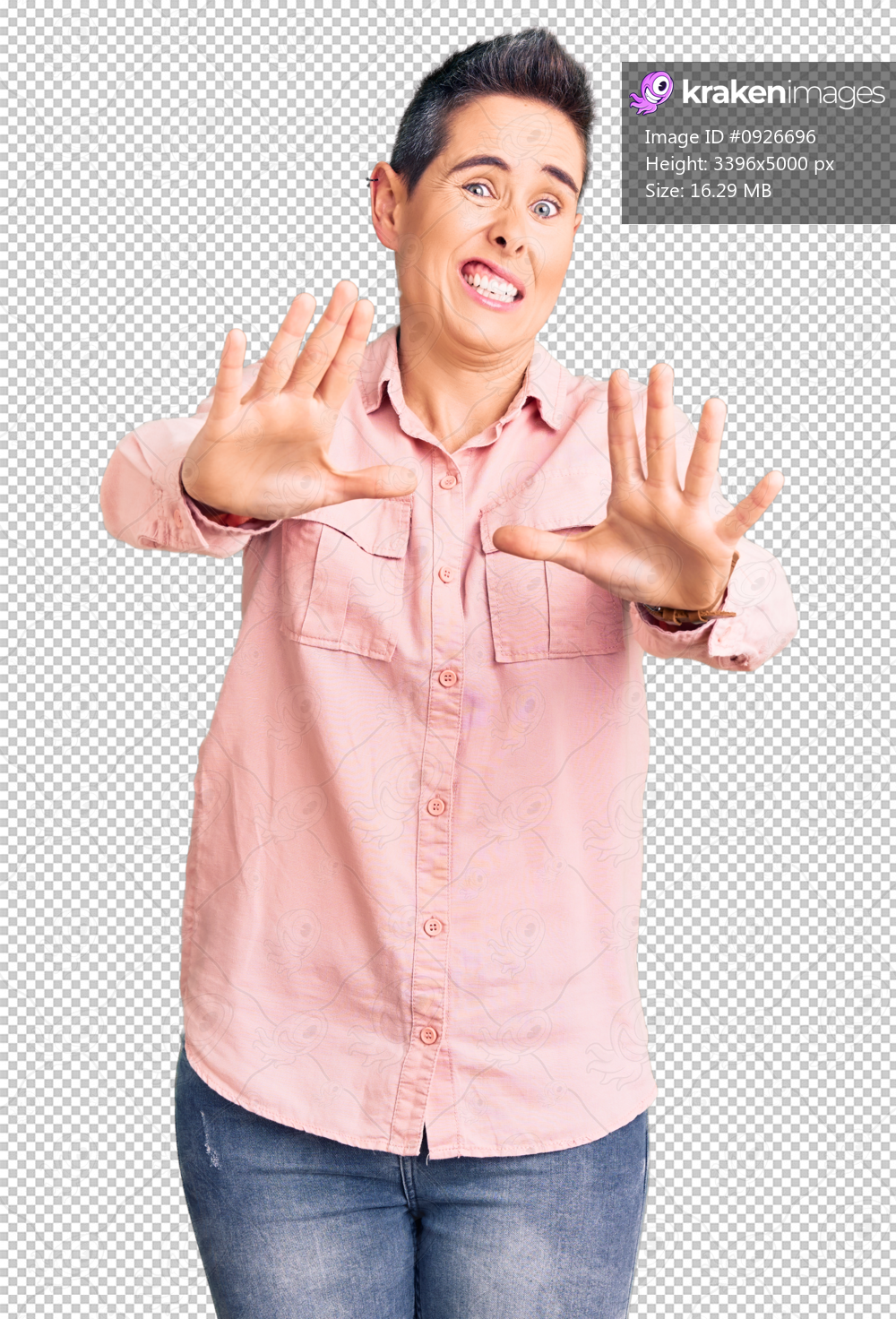 Young woman with short hair wearing casual clothes afraid and terrified with fear expression stop gesture with hands, shouting in shock. panic concept.