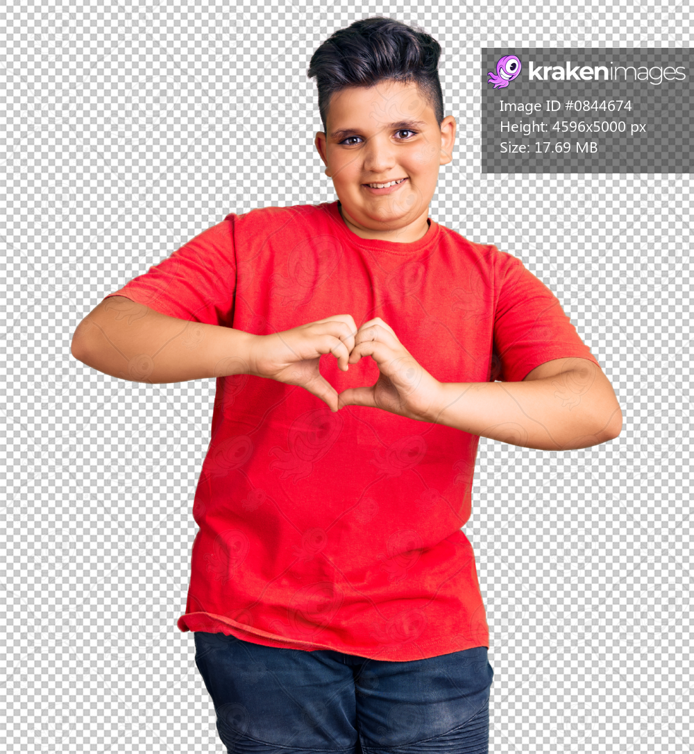 Little boy kid wearing casual clothes smiling in love showing heart symbol and shape with hands. romantic concept.