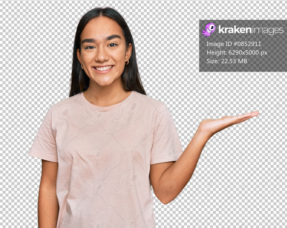 Young asian woman wearing casual clothes smiling cheerful presenting and pointing with palm of hand looking at the camera.