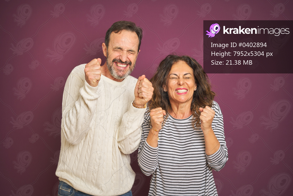 Beautiful middle age couple wearing winter sweater over isolated purple background excited for success with arms raised and eyes closed celebrating victory smiling. Winner concept.
