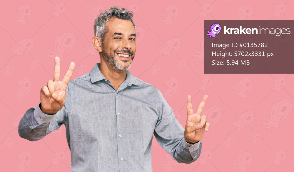 Middle age grey-haired man wearing casual clothes smiling looking to the camera showing fingers doing victory sign. number two. 