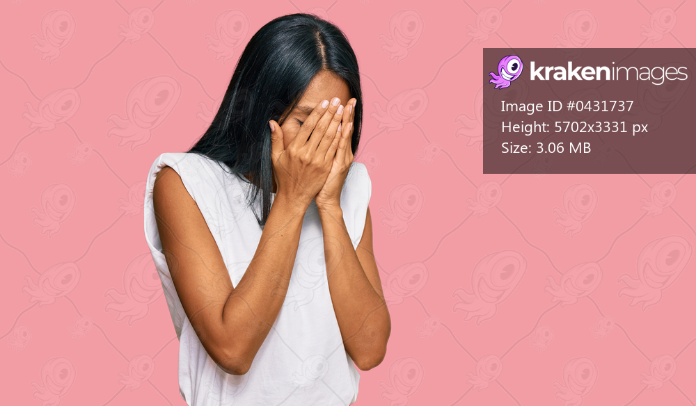 Young african american woman wearing casual clothes with sad expression covering face with hands while crying. depression concept. 