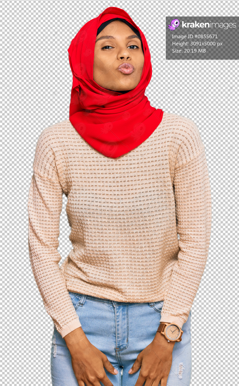 Young african american woman wearing traditional islamic hijab scarf looking at the camera blowing a kiss on air being lovely and sexy. love expression.