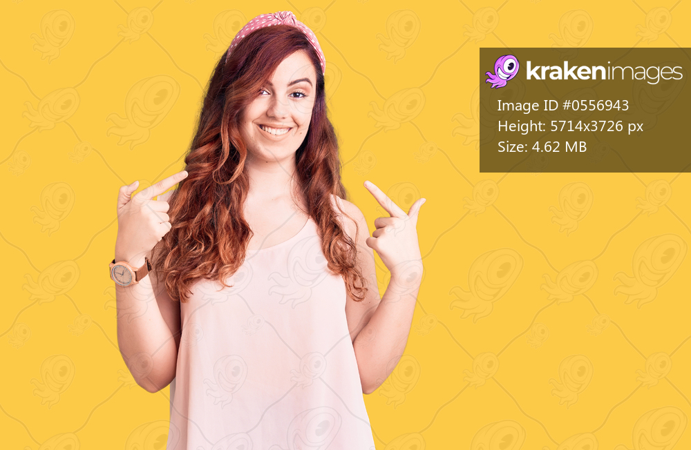 Young beautiful woman wearing casual clothes and diadem looking confident with smile on face, pointing oneself with fingers proud and happy. 