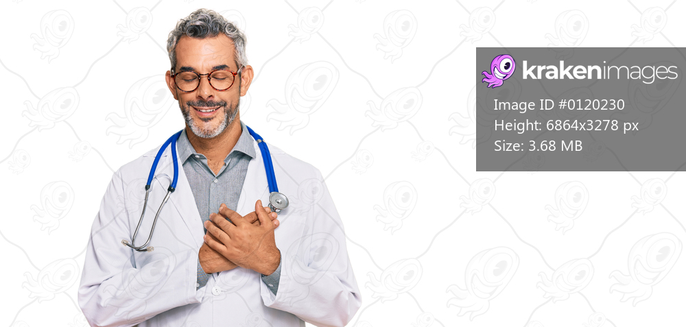 Middle age grey-haired man wearing doctor uniform and stethoscope smiling with hands on chest with closed eyes and grateful gesture on face. health concept. 