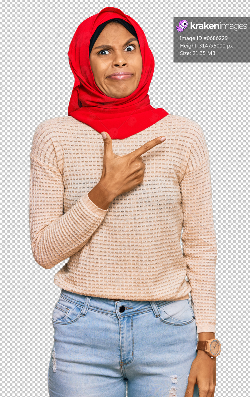 Young african american woman wearing traditional islamic hijab scarf pointing aside worried and nervous with forefinger, concerned and surprised expression