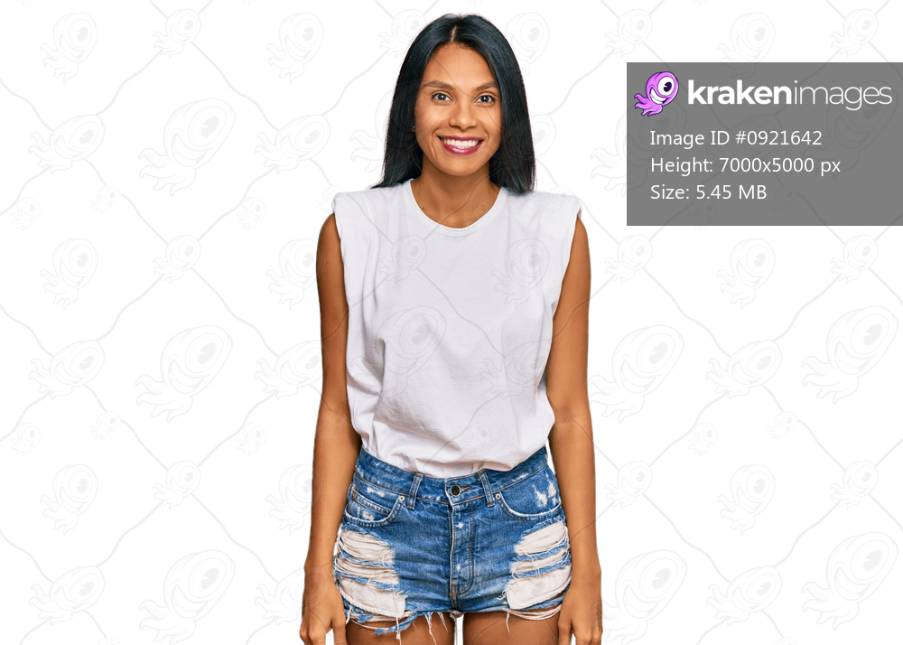 Young african american woman wearing casual clothes with a happy and cool smile on face. lucky person. 