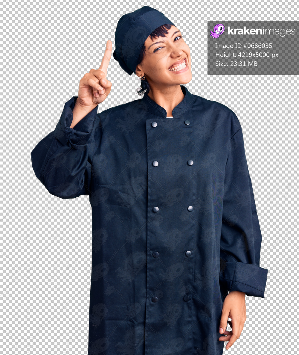 Young brunette woman with short hair wearing professional cook uniform pointing finger up with successful idea. exited and happy. number one.