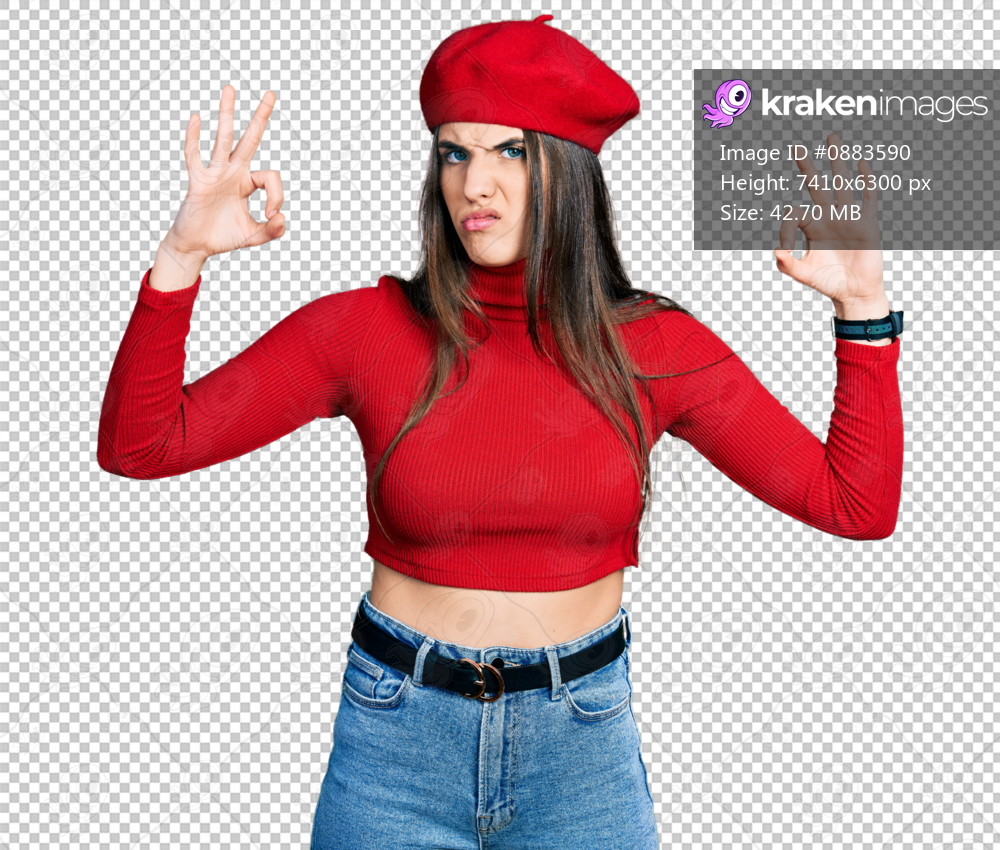 Young brunette teenager doing excellent gesture with hand clueless and confused expression. doubt concept.