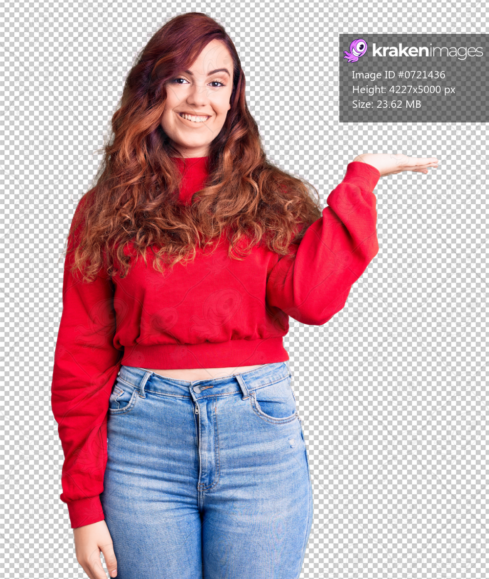Young beautiful woman wearing casual winter sweater smiling cheerful presenting and pointing with palm of hand looking at the camera.