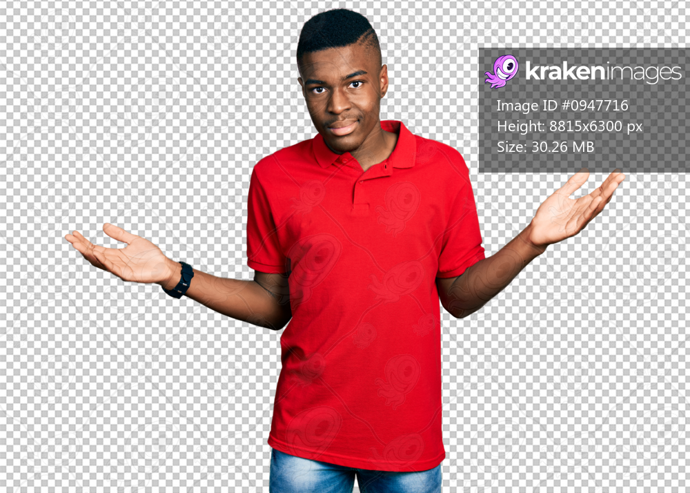 Young african american man wearing casual red t shirt clueless and confused expression with arms and hands raised. doubt concept.