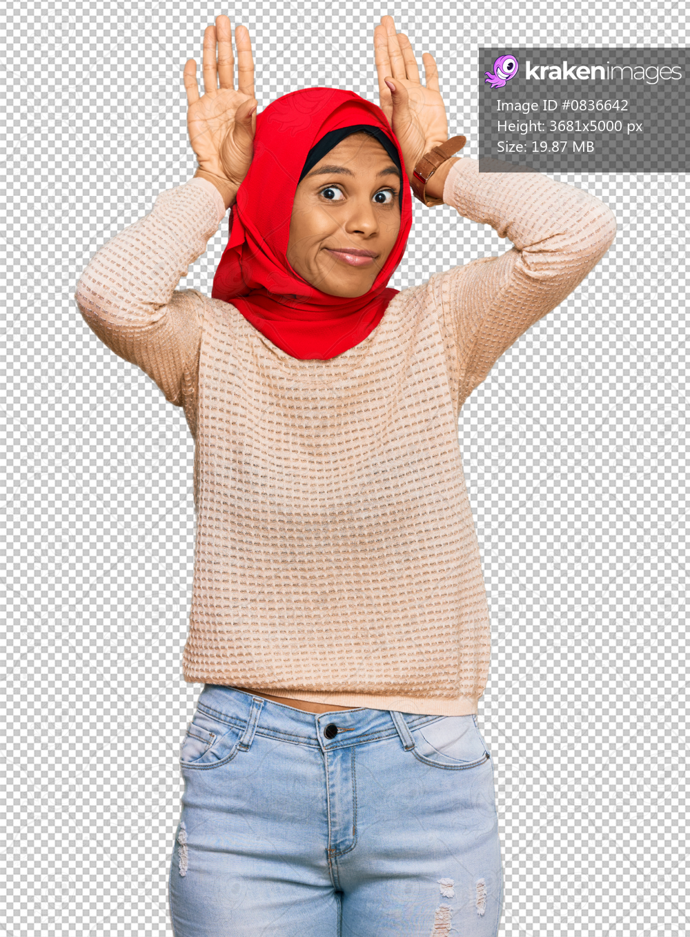 Young african american woman wearing traditional islamic hijab scarf doing bunny ears gesture with hands palms looking cynical and skeptical. easter rabbit concept.