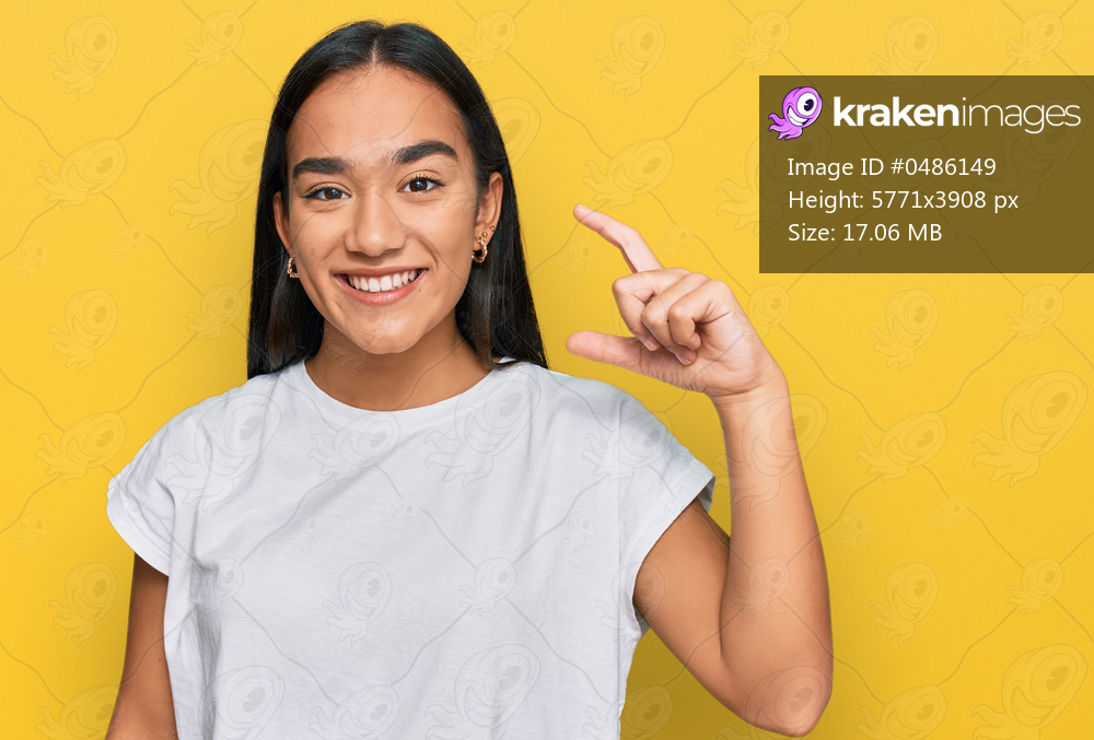 Young asian woman wearing casual white t shirt smiling and confident gesturing with hand doing small size sign with fingers looking and the camera. measure concept. 