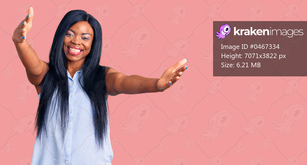 Young african american woman wearing casual clothes looking at the camera smiling with open arms for hug. cheerful expression embracing happiness. 