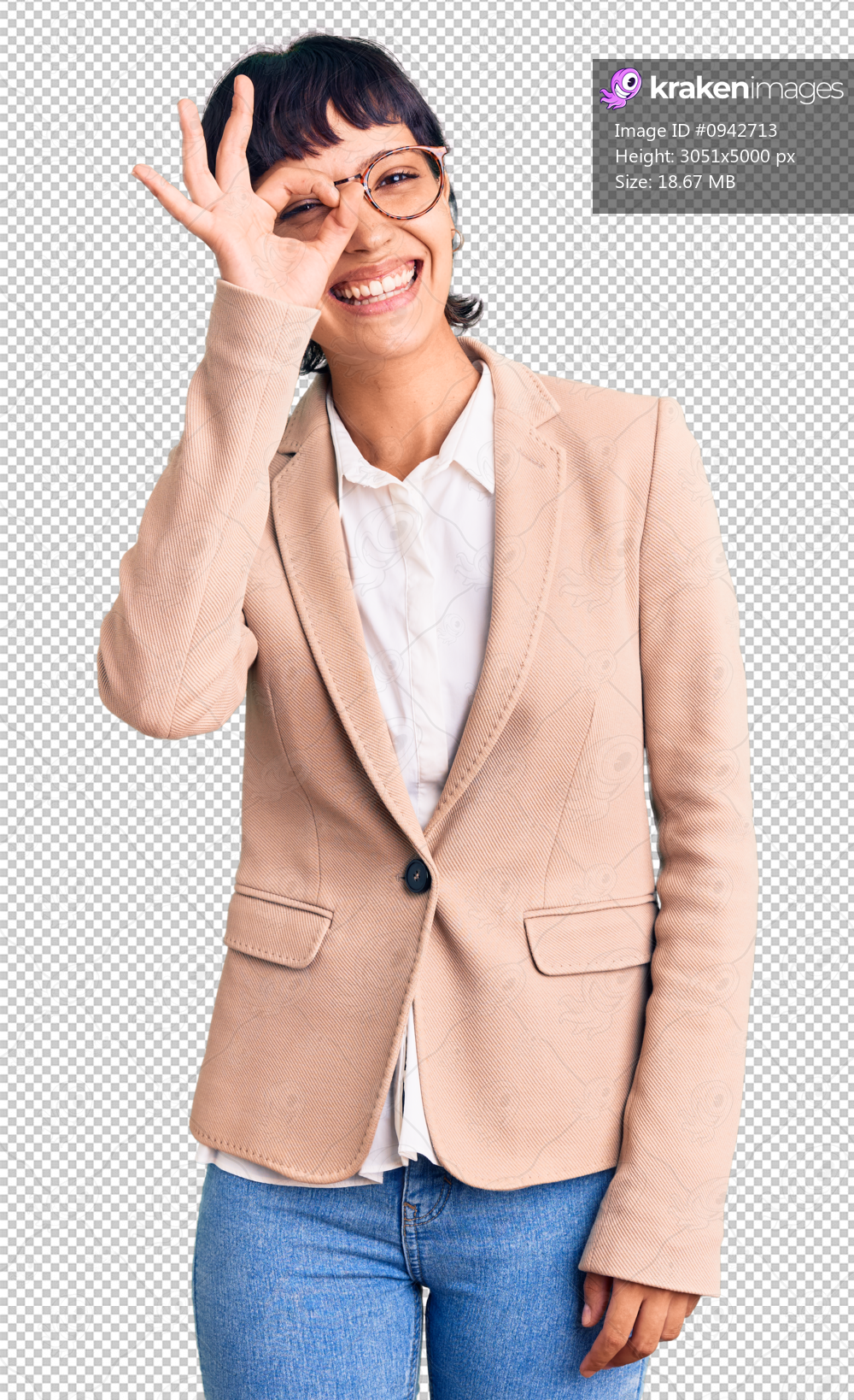 Young brunette woman with short hair wearing business jacket and glasses doing ok gesture with hand smiling, eye looking through fingers with happy face.